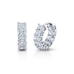 These stunning huggies are the perfect choice for a little luxurious sparkle. The average stone size is .19 carats for a total carat count of 4.16. These Radiant-Cut diamonds are precision cut by master jewelers to maximize brilliance, clarity and sparkle before being set in 18k white gold. Luxury Baguette Cut Diamond Earrings, Baguette Cut Diamond Earrings With Accents, Classic Diamond White Baguette Diamond Earrings, Diamond White Baguette Cut Diamond Earrings, Platinum Diamond Earrings With Baguette Diamonds For Anniversary, White Gold Diamond Baguette-cut Earrings, White Gold Diamond Accent Baguette Earrings, White Gold Baguette Cut Diamond Earrings With Accents, Diamond White Platinum Hoop Earrings With Diamond Accents