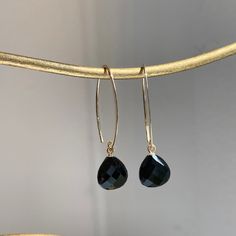 14KT yellow gold genuine black onyx teardrop earrings. Charming, teardrop black onyx, finished on all sides dangle on curved, V shape ear wire. Earring Measures: 1.50" x.60" Weight: 1.07 grams 10mm Checkerboard Faceted Onyx Curved 14KT Ear Wires Modern Black Long Drop Jewelry, Black Drop Jewelry With Pierced Details, Black Drop Earrings With French Hook, Black Teardrop Jewelry With Matching Earrings, Nickel Free Black Teardrop Jewelry, Black Pierced Long Drop Jewelry, Modern Black Jewelry With Ear Wire, Black Drop-shaped Pierced Jewelry, Nickel-free Black Teardrop Jewelry