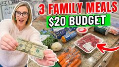 a woman holding up a $ 20 bill in front of her kitchen counter with the words 3 family meals on it