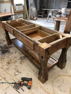 a wooden table being built in a workshop