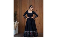 Black Lehenga With Floral Embroidery For Diwali, Black Floral Embroidered Lehenga For Diwali, Black Choli With Floral Embroidery For Festivals, Festive Black Choli With Floral Embroidery, Fitted Black Salwar Kameez With Intricate Embroidery, Black Dupatta With Floral Embroidery, Black Semi-stitched Choli With Floral Embroidery, Semi-stitched Black Choli With Floral Embroidery, Festive Black Lehenga With Floral Embroidery