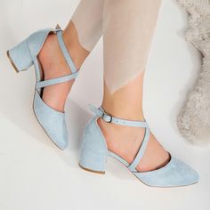 BABY BLUE BRIDE SHOES - BLUE WEDDING BLOCK HEELS - BABY BLUE SUEDE SHOES Welcome to Belle Wedding Shoes, your source for stunning baby blue low heels that effortlessly combine style and comfort.  Meticulously handcrafted with premium baby blue suede vegan leather, these bridal shoes feature a secure criss cross strap on the upper part and a closed-toe design, ensuring your feet stay comfortable all day. The timeless, sleek design effortlessly complements your wedding attire, and the 2.1-inch (approximately 5 cm) block heels provide the perfect elevation, enhancing both your confidence and stature. Whether you seek something blue or baby blue block heels, blue bridal shoes, elegant wedding heels, or blue bridal heels, our blue bridal shoes promise to improve your look and make you feel radi Blue Bride Shoes, Wedding Heels Blue, Bridal Shoes Blue, Blue Wedding Heels, Art Deco Wedding Shoes, Light Blue High Heels, Blue Bridal Heels, Classic Wedding Shoes, Blue Heels Wedding