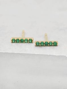 Bar design with Round Green Emerald Stones Gold Plated Stud Earrings by The Faint Hearted Jewelry Minimalist Bar, Emerald Green Earrings, Studs Gold, Jewelry Cleaning Solution, Bar Studs, Birthstone Earrings, May Birthstone, Birthstone Earring, Stone Gold