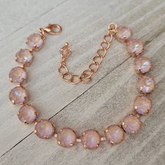 "♡ Genuine Austrian Crystals ♡ 8mm round chatons (5/16\") ♡ Color: Dusty Pink Delite ♡ Rose Gold plated (nickel free) ♡ Adjustable from 6 1/2\"-8 1/2\" ♡ Lobster claw clasp ♡ 2\" extender chain with crystal charm ♡ Handcrafted with love and attention to detail" Adjustable Rose Gold Round Crystal Bracelet, Adjustable Round Rose Gold Crystal Bracelet, Gold Wedding Bridesmaids, Pink Crystal Bracelet, Brass Bracelet, Crystal Ab, Rose Gold Wedding, Crystal Charm, Opal Crystal