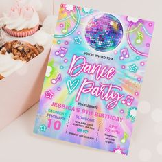 a birthday party with cupcakes, cake and disco ball