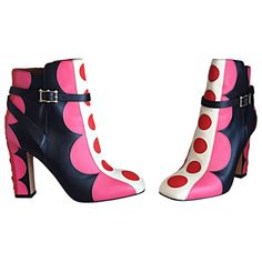 Amazing, and impossible to find never worn VALENTINO booties! Features the most luxurious leather in black, pink, red and ivory in a polka dot print. Zips up the interior side, and buckles around the ankle. Can easily be dressed up or down. Perfect with shorts, jeans, trousers, a skirt, or a dress. Olivia Polermo sported the same booties for the ad campaign (see photo). In perfect unworn condition. Comes with the original box. Made in Italy. Marked Size EU 36 / US 6 (Runs true to size) Heels Valentino, Valentino Boots, Sport Boots, Pink Booties, Polka Dot Shoes, Valentino Sandals, Real Leather Boots, Buckle Booties, Pink Boots