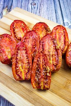 sliced tomatoes on a cutting board ready to be eaten