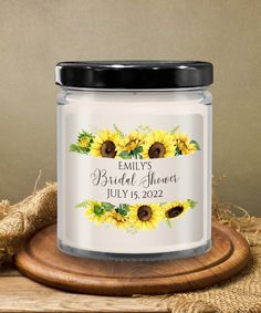 a white jar with sunflowers on it and the words, bridal shower