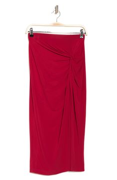 Side ruching adds definition to this midi-length skirt made from stretchy fabric. 30" length (size S) 95% polyester, 5% spandex Machine wash, line dry Made in the USA of imported fabric Model stats: 5'10" height, 32" bust, 25" waist, 36" hip. Model is wearing size S. Ruched Fitted Draped Maxi Skirt, Fitted Ruched Draped Maxi Skirt, Elegant Ruched Bottoms In Midi Length, Elegant Ruched Midi Bottoms, Elegant Ruched Midi Length Bottoms, Relaxed Ruched Draped Skirt, Draped Flowy Ruched Bottoms, Ruched Draped Flowy Skirt, Solid Ruched Maxi Skirt