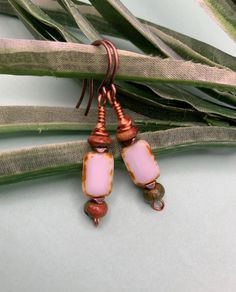 Travertine ivory rectangle beads paired with two tone unakite spacer beads, small copper spacers and copper ear wires.  The unique shape of the travertine beads makes this an interesting pair, but so easy to wear with many outfits.  Great gift idea too. Bohemian White Rectangular Earrings, White Bohemian Rectangular Earrings, Handmade White Rectangular Beaded Earrings, Handmade White Beaded Rectangular Earrings, Ivory Travertine, Brick Red, Bead Earrings, How To Make Beads, Spacer Beads