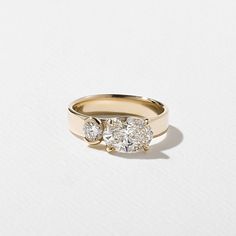 three stone diamond ring on white background