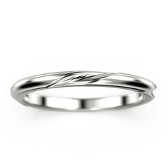 a white gold wedding ring with a twisted design