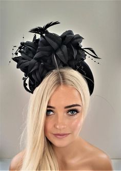 "Presenting a stunning beautiful black fascinator with feathers and beading, attached via a  satin covered headband  which is 4 cms in width at the widest part approximately and 3.5 cms in height (the headband) the feather flower design is much higher above the design. Perfect for special events.  If you would like the design customising at all, or an alternate colourway please get in touch with me and I will be delighted to help.   I do offer combined shipping on all my items, although this may Adjustable Tall Crown Headband, Black Headband Costume Hats For Spring, Black Headband For Spring Races, Elegant Costume Hat With Tall Crown For Party, Elegant Party Costume Hat With Tall Crown, Elegant Mini Hats With Tall Crown For Party, Adjustable Crown-shaped Fascinator For Party, Black Headband For Royal Ascot, Black High Crown Headpiece For Wedding