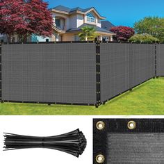 a large black privacy fence with metal studs on the sides and an image of a house in the background