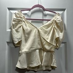 Bnwt!! Cream Colored Satin Soft Top. Ruched Shoulders That Can Be Worn Slightly Off The Shoulder. Peplum Bottom. Fitted Off White Blouse For Day Out, Fitted Summer Blouse In Cream, Fitted Cream Summer Blouse, Crochet Lace Blouse, Knotted Blouse, American Eagle Shirt, Eagle Shirts, Red Flannel, Corset Crop Top