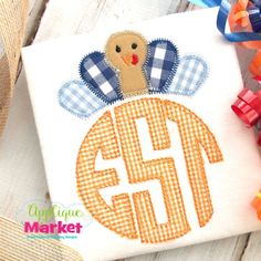 a turkey is on the front of a cross stitch appliqued gift box