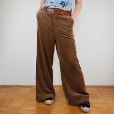 Vintage brown corduroy baggy pants in mint condition. Brand Lola Liza Belgian design Size 42 (us 12, uk 16) 85% polyester 12% nylon 3% spandex High waist with belt loops 4 pockets Wide leg  waist 44 cm = 17.3 inches hips 60 cm = 23.6 inches length 106 cm = 41.7 inches inseam 74 cm = 29.1 inches Brown High-waisted Corduroy Pants, Brown Full Length Corduroy Pants, Brown Corduroy Bottoms With Belt Loops, Full Length Brown Corduroy Bottoms, Retro Wide Leg Corduroy Bottoms, Corduroy Wide Leg Pants With Belt Loops, Wide Leg Corduroy Pants With Belt Loops, Belgian Design, Travel Pack