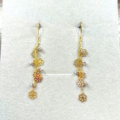 Beautiful, Feminine, Golden And Silver Colour, Long Earrings, Never Worn, Excellent Condition. Saudi Arabian Gold. Elegant Yellow Gold Dangle Cluster Earrings, Elegant Yellow Gold Cluster Dangle Earrings, Delicate Yellow Gold Linear Earrings For Anniversary, Yellow Gold Dangle Cluster Earrings For Anniversary, Gold Dangle Cluster Earrings Fine Jewelry, Delicate Yellow Gold Linear Earrings For Formal Occasions, Formal Yellow Gold Sterling Silver Flower Earrings, Gold Hallmarked Cluster Earrings, Delicate Gold Linear Earrings For Anniversary