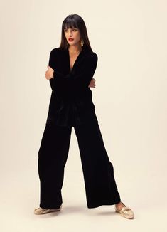 Introducing a sophisticated solid black jacket & pants co-ord set, meticulously crafted in luxurious silk velvet. This ensemble exudes timeless elegance and versatility, perfect for any occasion. Elevate your wardrobe with this chic combination, designed to make a statement with effortless style. Luxury Pantsuit For Night Out, Chic Winter Evening Sets, Chic Evening Sets For Winter, Chic Black Velvet Outerwear, Luxury Evening Pantsuit For Fall, Elegant Winter Loungewear Sets, Luxury Long Sleeve Fall Pantsuit, Luxury Long Sleeve Pantsuit For Fall, Luxury Velvet Suit For Work