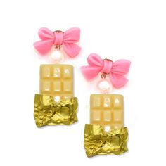 two pieces of candy with bows on them