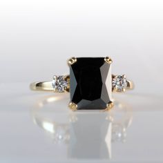 Don't miss this opportunity to own this beautiful gemstone ring! => Gemstone Type - Onyx, Clear Quartz => Gemstone Cut - Faceted => Gemstone Size - 8*10 mm, 3 mm => Total Number of Gemstones - 3 => Metal Type - 14k Gold Filled (Tarnish Resistant and Nickel Free) - also available in 925 sterling silver and 14k solid gold * Please contact me for pricing on sizes larger than 11 * ~ Feel free to ask me about custom made designs. ❏ Replacements and custom orders: ✪ 925 sterling silver - no additional Modern Rings With Rectangular Accent Stones, Modern Ring With Rectangular Accent Stones, Classic Crystal Ring With Rectangular Gemstone, Rectangular 14k Gold Jewelry With Accent Stones, Modern Jewelry With Rectangular Accent Stones, Rectangular Three Stone Diamond Jewelry, Three Stone Rectangular Diamond Jewelry, Fine Jewelry With Three Stone Rectangular Design, Fine Jewelry Rectangular Three Stone