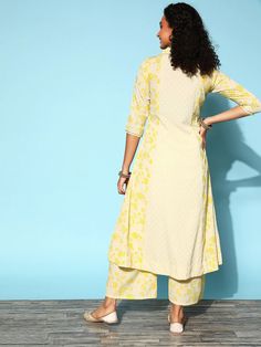 This is 2 piece set. The set consists of printed kurta has v neck, 3/4th sleeves & calf length teamed with solid flared palazzo pants with elasticated waistband. 2 piece Set Color-Yellow Kurta Fabric-Poly Crepe Neck - V Neck Sleeves-3/4th Sleeves Work-Print Detailing Bottom Fabric-Poly Crepe Work-Solid Style-Flared Palazzo Pants Washing Instructions-Hand Wash Flare Palazzo Pants, Yellow Kurta, Kurta Palazzo Set, Flared Palazzo, Modest Evening Dress, Kaftan Abaya, Kurta Pant Set, Palazzo Set, Moroccan Caftan