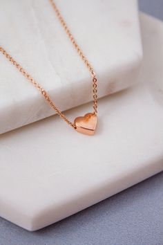 Dainty and stylish Rose gold small Heart charm necklace is great to wear for everyday or special occasions Available in rose gold SIZE ♥ Chain Length : 16.5 '' ( as pictured ) Please you can CHOOSE your chain length( 15 inches - 18 inches ) before purchasing this item ! * necklace sizes * 15 inches: around neck 16 inches: standard short 17 inches: average length 18 inches: standard long SHIPPING TIME Fast shipping within 1 - 3 days **Your order will be ready to be shipped within 3 business days Personalized Rose Gold Heart Necklace For Her, Rose Gold Charm Necklace With Heart Pendant, Rose Gold Heart Pendant Charm Necklace With Delicate Chain, Rose Gold Double Heart Charm Necklace For Valentine's Day, Valentine's Day Rose Gold Clavicle Chain Necklace, Rose Gold Heart Pendant Charm Necklace, Rose Gold Double Heart Charm Necklace With Delicate Chain, Minimalist Rose Gold Charm Necklace For Anniversary, Rose Gold Double Heart Necklace With Delicate Chain