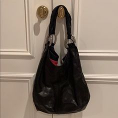 Much Loved Shoulder Hobo Bag. The Exterior Glazed Black Leather Is Sumptuous & In Very Good Condition But For Two White Spots On Bottom That A Little Solvent May Clean. Hot Pink Interior Fabric Is Very Stained. Hot Pink Interior, Pink Interior, Interior Fabric, Hobo Bag, Miu Miu, Classic Black, Hot Pink, Black Leather, Bag Lady