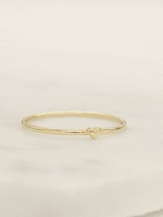 Don't wear your heart on your sleeve - wear it on your finger, shh..it's our little secret. Our Teeny Tiny Heart Ring is handcrafted in solid 14K gold in 1.15 mm width, lightweight and durable. Heart On Your Sleeve, Tiny Heart, Solid Gold Rings, Heart On, Wear It, Heart Ring, Solid Gold, Gold Rings, White Gold