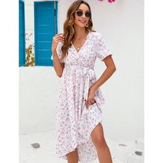 This wrap midi nursing dress is designed with short sleeves, a V-neckline, and a ruched waist for a flattering fit. The knee-length A-line babydoll silhouette and empire waist, paired with a belt, create a chic and flowy swing style that is both comfortable and fashionable. Available in a selection of solid colors and floral prints, this dress offers a versatile range of styling options to suit any occasion. V-neck Midi Dress With Ditsy Floral Print For Summer, Printed Short Sleeve Midi Dress For Spring, Floral Print Short Sleeve Midi Dress For Brunch, Summer Floral Print Midi Length Short Sleeve Dress, Knee-length Summer Floral Dress For Daywear, Summer Floral Print Midi Short Sleeve Dress, Summer Midi Dress With Short Sleeves And Print, Casual V-neck Short Sleeve Dress With Floral Print, Short Sleeve Midi Dress For Spring Beach Outings