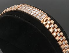 925 Sterling Silver - Cubic Zirconia Rose Gold Plated Chain Bracelet - BT4169  925 Sterling Silver - Cubic Zirconia Rose Gold Plated Chain Bracelet - BT4169  Jewelry Type:         Bracelet   Metal Type:            925 Silver  Metal Size:             9.25" Length  .50" Height   Stone Type:            Cubic Zirconia  Condition:              N/A  Jewelry Weight:     58.8 Grams  PLEASE NOTE: THIS ITEM IS PRE-OWNED. ALTHOUGH MOST ITEMS ARE IN VERY GOOD CONDITION, SOME MAY NEED CLEANING AND/OR MINOR R Elegant Rose Gold Iced Out Jewelry, Bracelet Metal, Metal Bracelets, Gold Plated Chains, Rose Gold Plates, Chain Bracelet, Types Of Metal, Metallic Silver, 925 Silver