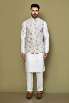 Sea green sleeveless bundi with thread patchwork embroidery in floral pattern. Paired with white full sleeve kurta and pant. - Aza Fashions Spring Sleeveless Nehru Jacket With Chikankari Embroidery, Nehru Jackets, Fashion App, Mandarin Collar, Full Sleeve, Embroidery Thread, Aza Fashion, Thread, Floral Pattern