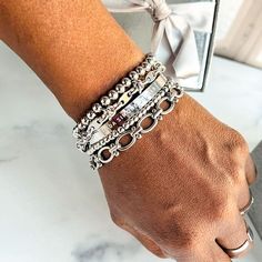 Give yourself options with the Chrisette Bracelet Stack. This bracelet stack features five dainty bracelets that are designed to mix and match for an assortment of styles. Wear just one, two or three - or stack them all for an extra pop! This braclet stack includes: - Nakia stainless steel beaded bracelet (4mm and 6mm) - Jada stainlesss steel bracelet - Lily stainless steel bracelet - Darla stainless steel bracelet Fits wrists up to 7.5 inches Bracelet size guide Bracelet Stacks, Stacked Earrings, Dainty Bracelets, Anklet Bracelet, Silver Pieces, Watch Necklace, Arm Candy, Bracelet Stack, Steel Bracelet