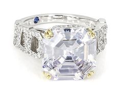 Vanna K™ for Bella Luce® white diamond simulant 15.74ctw square and round, Platineve® asscher cut ring. Measures approximately 0.81" L x 0.47" W and is not sizable. The diamond equivalent weight is 9.53ctw. Each Vanna K™ design has a signature label that features a lab created sapphire. White Octagon Diamond Ring With Accents, Luxury White Octagon Ring, White Octagon Diamond Ring With Vvs Clarity, White Asscher Cut Rings With Diamond Accents, White Octagon Cubic Zirconia Diamond Ring, White Diamond Ring With Vs Clarity In Asscher Cut, White Octagon Rings With Diamond Accents, White Asscher Cut Diamond Ring With Vs Clarity, White Asscher Cut Diamond Ring For Formal Occasions