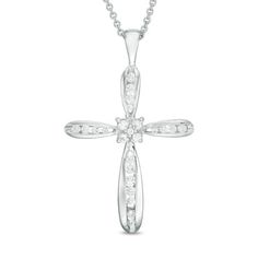 A gift of faith, this pretty diamond cross pendant is certain to be treasured. Crafted in 14K white gold, this rounded-edged design features a sparkling prong-set diamond square at its center and channel-set diamonds along each of the arms. Radiant with 1/4 ct. t.w. of diamonds and a bright polished shine, this cross suspends along an 18.0-inch cable chain that secures with a spring-ring clasp. Diamond Cross Pendants, Diamond Cross, Cross Jewelry, Channel Set, Diamond Stone, Diamond Clarity, White Metal, Necklace Designs, Cable Chain