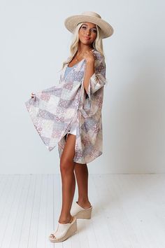 You can never be too chic...especially when you layer up in style with this unique sky blue colored overlay! It features ultra lightweight breezy material patterned with a variety of intricate patchwork patterns, oversized 3/4-length sleeves, and a draped open front silhouette that cascades into a straight mid-thigh length hemline with accent side slits! Patchwork Patterns, Front Open, High Low Dress, Sky Blue, Blue Sky, Length Sleeve, Sleeve Length, Luxury Fashion, Fashion Trends