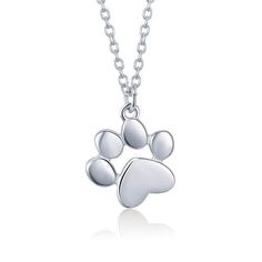 Sterling silver paw print represents cat or dog Your choice of platinum plating, rose gold plating or 18k gold plating Paw pendant approx. 0.55" W (1.4 cm) x 0.59" H (1.5 cm) Chain length approx. 18" (46 cm) Extension chain approx 4" (10 cm) Matches the Paw Stud Earrings Note: Please allow 2-3 weeks for delivery. However, you may experience additional delays due to COVID-19. Cat Paw Necklace, Dog Paw Pendant, Cat Footprint, Paw Print Pendant, Pet Paw Print, Paw Print Necklace, Cat Paw Print, Silver Cat, Lovely Jewellery