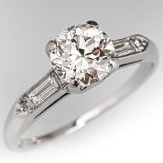 an antique diamond ring with baguets