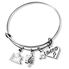 PRICES MAY VARY. BAND JEWELRY- Music Charm Bangle Bracelet for Girls, Teens and Women MARCHING BAND BRACELET- Silver plated music charms on bangle bracelet ADJUSTABLE- Adjustable Bangle Bracelet, Made to Accommodate Most Wrist Sizes GIFT IDEAS -Perfect gifts for her birthday, Christmas, Special Occasion or just because FREE JEWELRY POUCH- Only The Most Elegant Velvet Jewelry Pouches Are Used To Package And Ship Our Bracelets, Ensuring The Most Beautiful Presentation Possible.  Music Melody Brace Marching Band Gift, Musical Symbols, Band Instruments, Music Bracelet, Gift For Musician, Band Stickers, Gifts For Her Birthday, Jewelry Pouches, Adjustable Bangle Bracelet