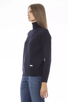 Elevate your wardrobe with the sumptuously soft Baldinini Trend Turtleneck Sweater. Crafted from a premium blend of 50% wool and 50% cashmere, this luxurious piece offers unmatched comfort and elegance. The rich blue hue enhances its sophisticated silhouette, while the fine ribbed knit at the neck, cuffs, and hem adds a refined touch. A unique metal monogram of Baldinini Trend gracefully adorns to manifest your love for the brand. Perfect for those who aim to merge style with coziness in their d Blue Wool Sweater, Women Turtleneck, Cashmere Color, Womens Turtleneck, Women Sweater, Blue Wool, Blue Hues, Wool Sweater, Platform Wedges