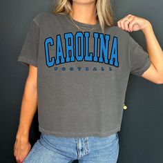 Vintage Carolina Football cropped Tshirt Carolina Shirt Football T-shirt retro Carolina Tee Football Gift Comfort Color Crop Top -Please check Color and Size Charts before placing the order. You can find them in the listing's photos (Depending on what device you are viewing this listing colors may vary slightly). -Returns and exchanges are accepted only if there are defects "No Extra Costs" We create custom t-shirts with great designs for everyone's liking. If you don't find the size or color yo Cropped Short Sleeve T-shirt With Letter Print For College, Cropped Short Sleeve Letter Print T-shirt For College, Cropped Letter Print T-shirt For College, Short Sleeve Cropped T-shirt With Letter Print For College, Casual Cropped T-shirt With Letter Print For College, Carolina Football, Cropped Tshirt, Football Gift, Colorful Crop Tops