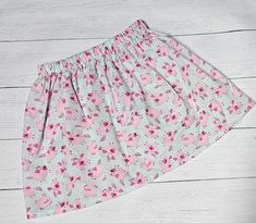 You will receive a fabric skirt made with cute pig fabric with an elastic waist band. Fabric is cotton material with an elastic waist band.  They are lightweight skirts for ease of movement and playtime.  Please refer to the size chart when ordering. Age     Waist           Length 2T        17 inches    9 inches 3T        18 inches    10 inches 4T        19 inches    11 inches 5T        20 inches    12 inches If you need a bigger size than what is listed, please message me. Please allow 1-2 week Pink Cotton Dress With Elastic Waistband, Cute Cotton Skirt, Farm Outfit, Pig Fabric, Pig Dress, Farm Clothes, Fabric Skirt, Girls Skirts