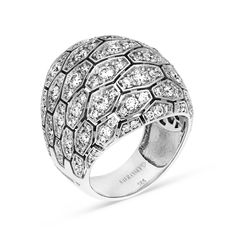 Make a fashion statement with our Diamond Pave Dome Cocktail Ring. Hand made with 18K white gold, this ring features a cluster of elongated hexagons paved with three small round brilliant cut diamonds crafted in a dome shape. The perfect gift for a woman who enjoys standing out in a crowed with unique designer jewelry pieces. Available in all sizes, send us yours! 2.67 carat cocktail ring 14K white gold The ring design can be customized to suit your particular taste & budget with any Size, C Cocktail Ring Designs, Crossover Diamond Ring, Bling Ideas, Rose Gold Diamond Ring, Ring Hand, Unique Jewelry Designs, Blue Sapphire Rings, Love Ring, Blue Rings