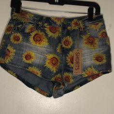 Rue 21 Sunflower Shorts Jeans Completely New With Tag Size: 5/6 About S Condition: New With Tags Multicolor Floral Print Bottoms For Summer, Multicolor Floral Print Summer Bottoms, Summer Floral Print Multicolor Bottoms, Summer Printed Short Bottoms, Trendy Printed Short Bottoms, Trendy Yellow Shorts For Spring, Fitted Floral Print Shorts, Multicolor Jean Shorts For Spring And Summer, Spring Printed Short Bottoms