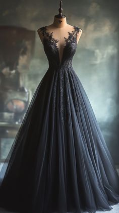 a black evening gown on a mannequin