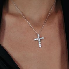 This cross pendant is timeless and perfect. The high-quality natural diamonds set in 14K white gold serve as a defining symbol of your faith. Pair this with any of the devotional pieces in our Religious Collection. Natural Diamonds: 2.05ctw 14K White Gold Length: 1 Inch (Chain not included) Luxury White Gold Sterling Silver Cross Necklace, White Gold Diamond Cross Necklace For Wedding, White Gold Diamond Cross Necklace, White Gold Cross Necklace With Brilliant Cut Cubic Zirconia, Luxury Silver Cross Diamond Necklace, White Diamond Cross Necklace For Weddings, White Gold Cross Necklace With Brilliant Cut, White Diamond Cross Necklace With Diamond Cut, White Diamond Cross Necklace With Brilliant Cut