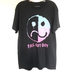 Fall Out Boy Black Band T Shirt Fall Out Boy Band T-Shirt Featuring A Front Smiley Face Graphic Soft Cotton Cut In A Relaxed Fit With Short Sleeves Crew Neck. - 100% Cotton, - New - Large - Chest: 22” - Length 31” Fall Out Boy Black T Shirt Black Graphic T-shirt For Fall, Emo Black T-shirt With Graphic Design, Black Punk T-shirt For Fall, Black Logo Print T-shirt For Fall, Black Edgy Shirt With Graphic Print, Emo Style Fall T-shirt For Streetwear, Black Text Print Shirt For Fall, Black Graphic Design T-shirt For Fall, Black Emo T-shirt For Fall