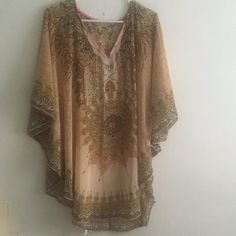 Cream & Tan Boho Print Beach Coverup - New With Tag V-Neck With Pink Trim Batwing Sleeve Front Rhinestone Decor One Size 100% Polyester Length Approx 32 Inches Casual Beige V-neck Cover-up, Beige V-neck Top For Beach Cover-up, Casual Brown V-neck Kaftan, Brown Tops For Beach Vacation, Brown Tops For Vacation And Beach Season, Cream V-neck Top For Beach, Flowy Beige Tops For The Beach, Beige V-neck Kaftan For Vacation, Casual Brown Kaftan For Vacation