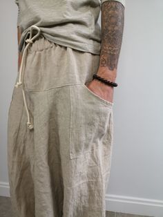 Undyed Natural Linen Harem Pants Men Women Relaxed Style Cofortable Clothing Nice to wear outside or inside. Ready to ship. S - M - L size. Total lenght is 106cm ( 41in) The lenght of the rubber band is 90cm ( when not streched) If the wider waist is required - it would be altered acording your waist measurements - contact me prior purchasing. Pure linen unisex pants, made of 100% European linen, mid-weight. NOTE: These pants are sewn with strong poliester thread to insure the long lasting wear. Casual Beige Harem Bottoms, Beige Harem Pants With Side Pockets For Summer, Summer Beige Harem Pants With Side Pockets, Harem Bottoms With Pockets For Summer, Summer Harem Bottoms With Pockets, Harem Pants With Pockets For Loungewear, Harem Loungewear Bottoms With Pockets, Relaxed Fit Harem Pants With Hip Pockets For Summer, Summer Wide Leg Harem Pants With Hip Pockets