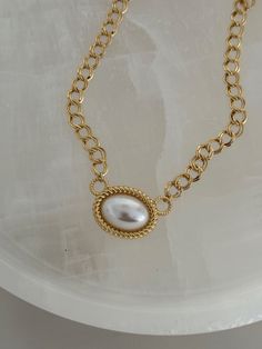 Chunky gold necklace with center pearl detail, 16in long Gold Pearl Pendant Choker Necklace, Gold Choker Chain Necklace With Pearl Pendant, Gold Pearl Chain Choker, Gold Baroque Pearl Choker Necklace, Gold-tone Pearl Necklace With Pearl Chain, Gold-tone Pearl Chain Necklace, Gold Pearl Drop Choker Necklace, Chunky Gold Necklace, Chunky Gold Necklaces